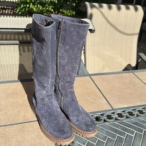 Purple, yes, purple, beautiful purple, very soft, suede women’s boots.